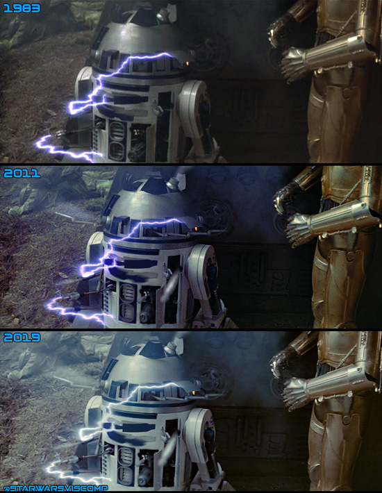 Starting in 2011 after R2 is shot, his center area (the blue bits and the vents) were replaced with CG and additional bits were added. The part that shot water now shoots steam and the ground in the background was replaced to cover the water stream. This was redone for the 4K.