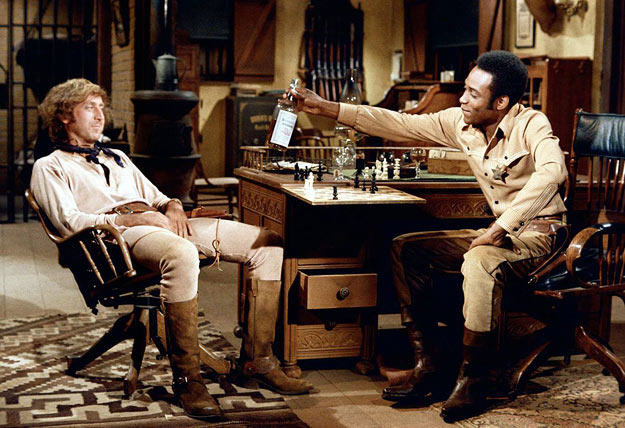 Gene Wilder and Cleavon Little as Jim “the Waco Kid” and Sheriff Bart in Mel Brooks’ Blazing Saddles (1974).